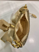 Bolsa Prada Dourado