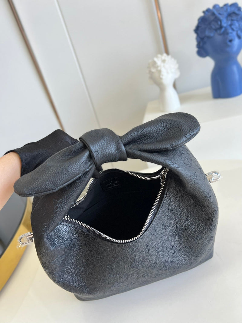 Bolsa Louis Vuitton Why Knot PM