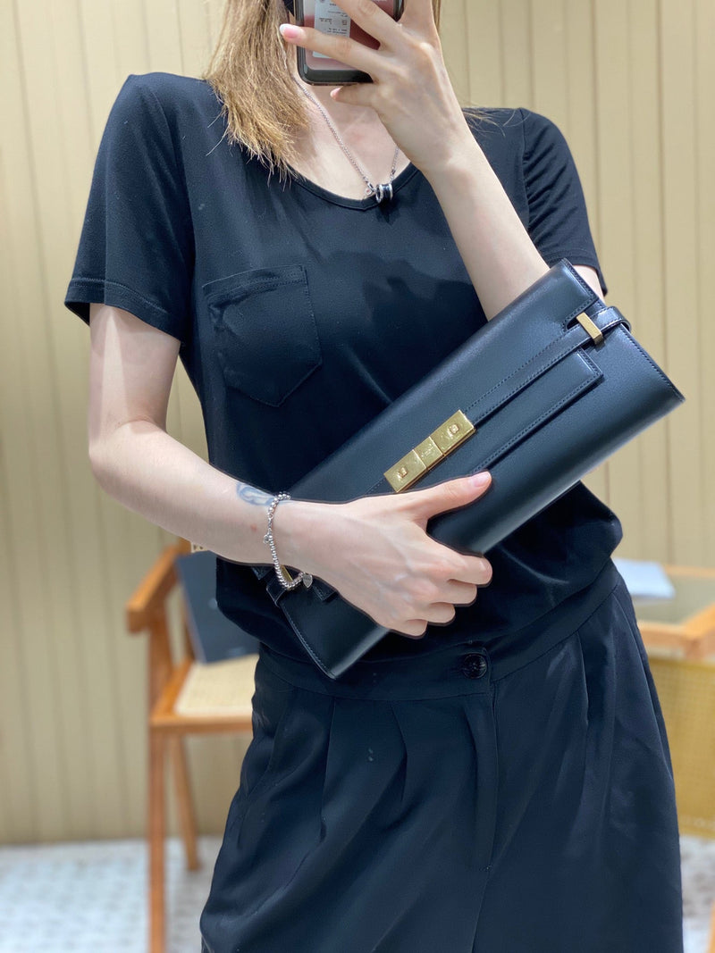 Bolsa YSL 𝗠𝗮𝗻𝗵𝗮𝘁𝘁𝗮𝗻 𝗖𝗹𝘂𝘁𝗰𝗵