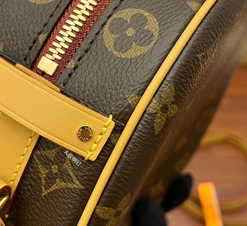 Bolsa Louis Vuitton Boîte Chapeau Souple MM