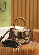 Bolsa Gucci Bamboo 1947 jumbo GG small top handle bag