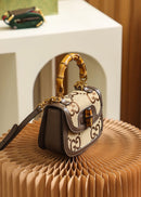 Bolsa Gucci Bamboo 1947 jumbo GG small top handle bag