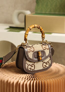 Bolsa Gucci Bamboo 1947 jumbo GG small top handle bag