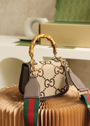 Bolsa Gucci Bamboo 1947 jumbo GG small top handle bag