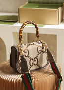 Bolsa Gucci Bamboo 1947 jumbo GG small top handle bag
