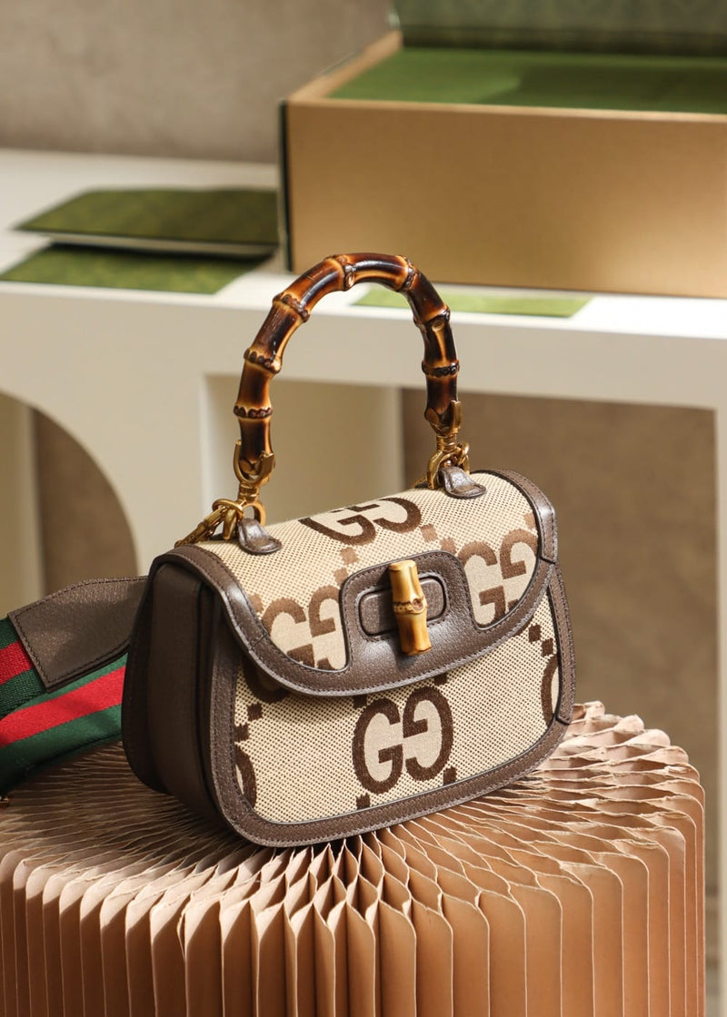 Bolsa Gucci Bamboo 1947 jumbo GG small top handle bag