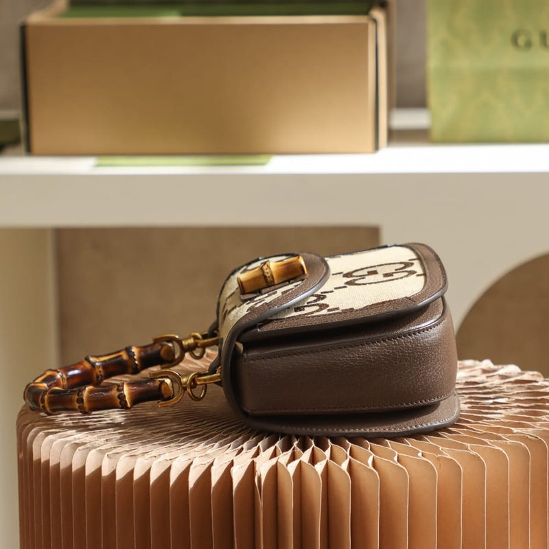 Bolsa Gucci Bamboo 1947 jumbo GG small top handle bag