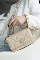 Bolsa CHANEL 19 WOC