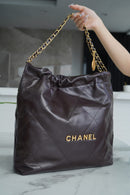 Bolsa CHANEL 22