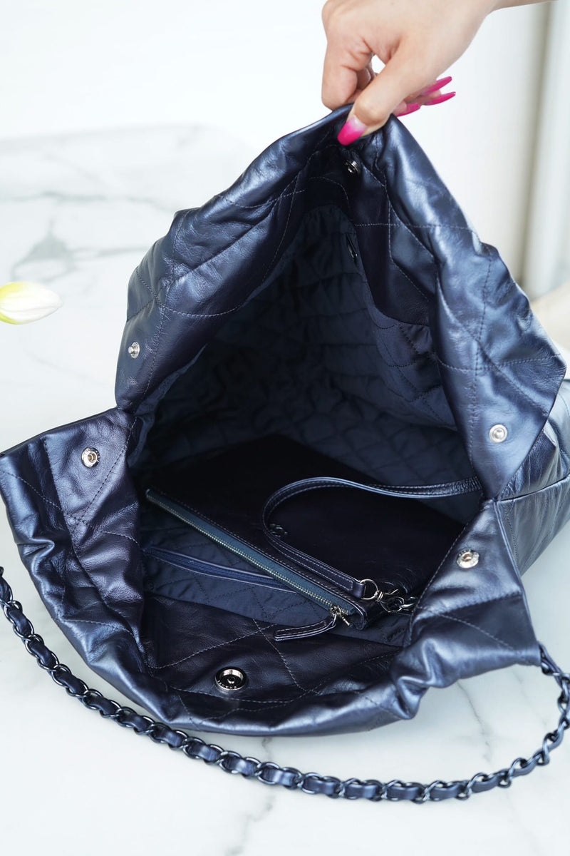 Bolsa CHANEL 22