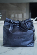 Bolsa CHANEL 22