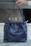 Bolsa CHANEL 22