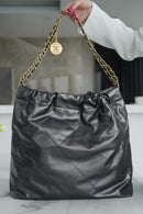 Bolsa CHANEL 22