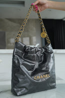 Bolsa CHANEL 22