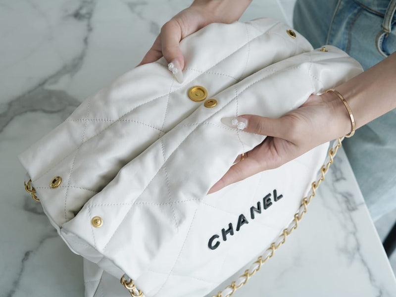 Bolsa CHANEL 22