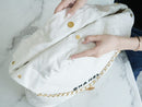 Bolsa CHANEL 22