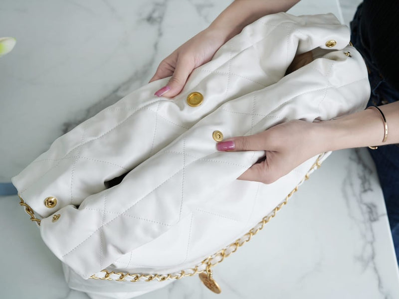 Bolsa CHANEL 22