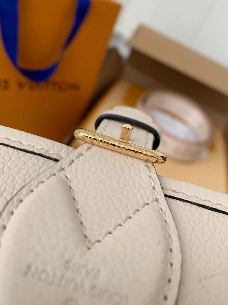 Bolsa Louis Vuitton Diana Creme