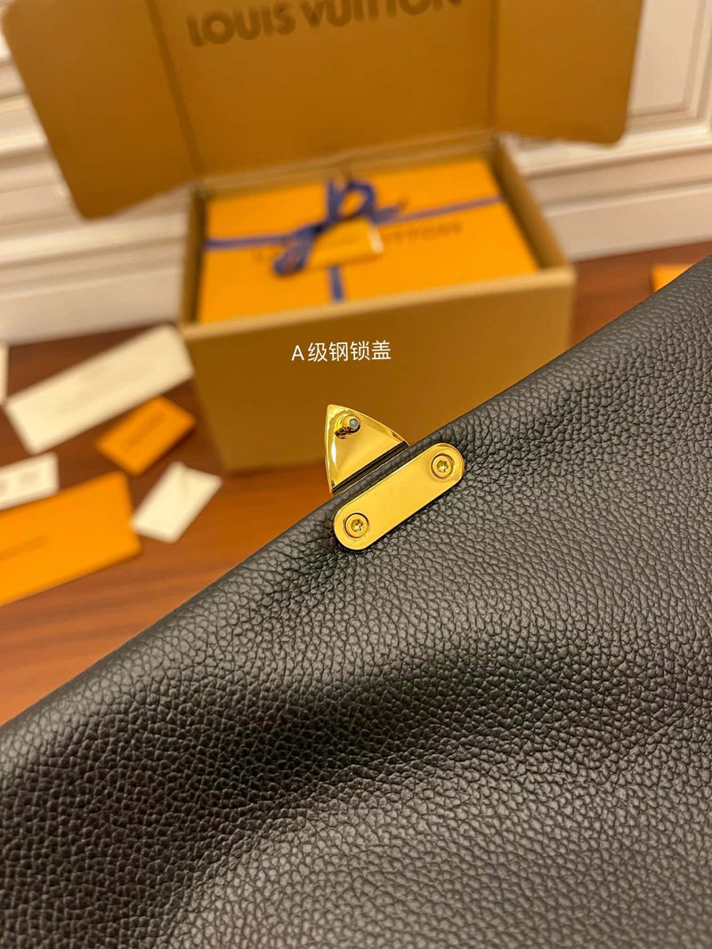Bolsa Louis Vuitton Madeleine MM